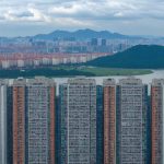 The Unraveling of China’s Real Estate Giant: A Debt Crisis of Unprecedented Scale